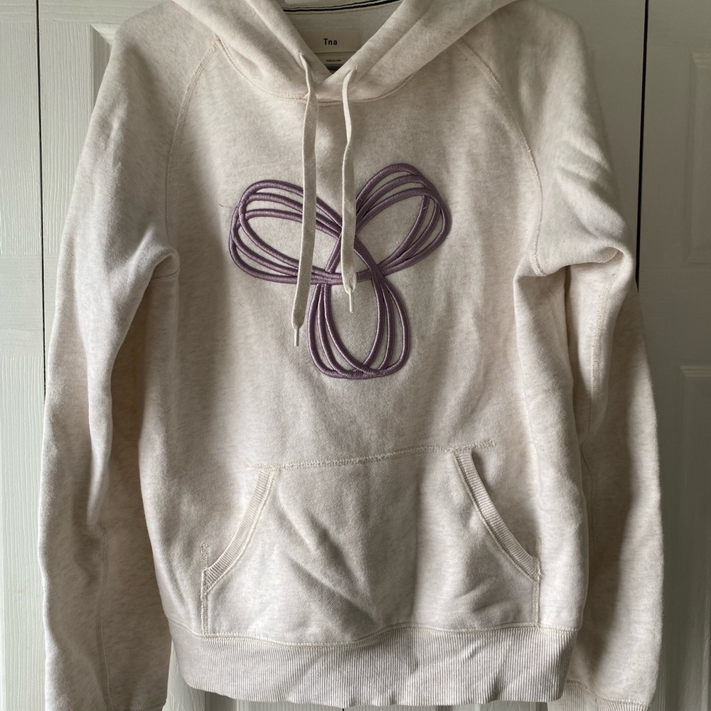 SOLD TNA Off-White Hoodie with Purple Graphic